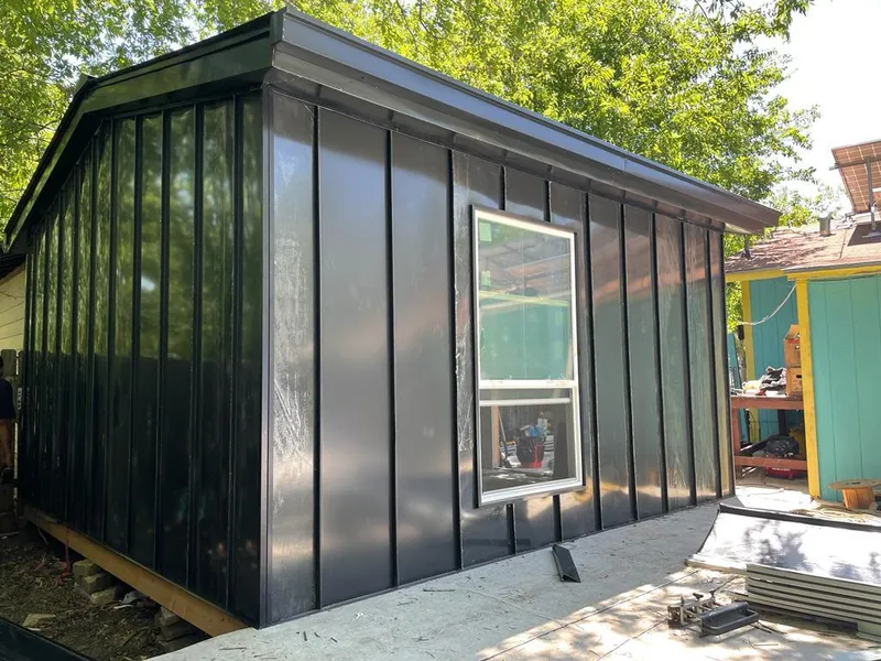 Black standing seam metal wall panels for Metal Roof Installation in Madison Heights